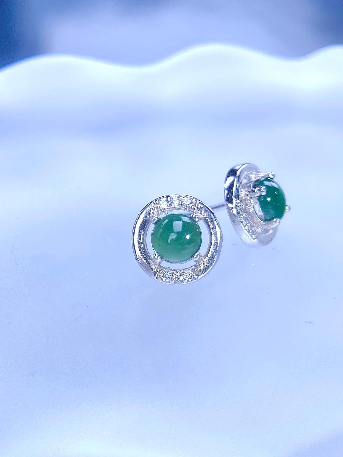 Circular green jadeite studs